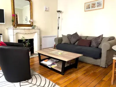 Coin salon dans l'établissement L'appartement Boulnois