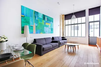 Coin salon dans l'établissement Elegant apartment - 1BR-6P- Grands Boulevards