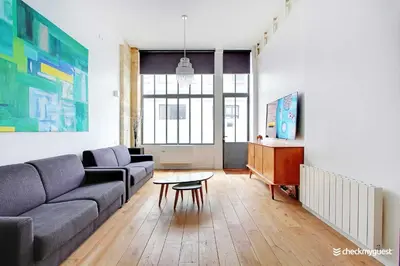 Coin salon dans l'établissement Elegant apartment - 1BR-6P- Grands Boulevards