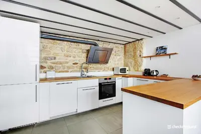 Cuisine ou kitchenette dans l'établissement Elegant apartment - 1BR-6P- Grands Boulevards