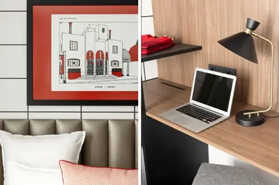 Télévision ou salle de divertissement dans l'établissement Hôtel Moderniste