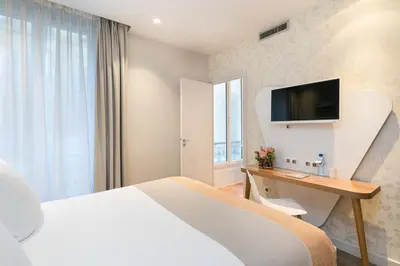 Télévision ou salle de divertissement dans l'établissement Hotel Magenta 38 by Happyculture
