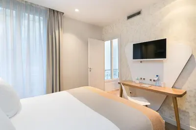 Télévision ou salle de divertissement dans l'établissement Hotel Magenta 38 by Happyculture