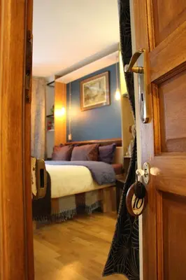 Un ou plusieurs lits dans un hébergement de l'établissement Cédric Accueille - Homestay PARIS