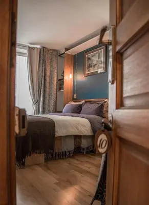 Un ou plusieurs lits dans un hébergement de l'établissement Cédric Accueille - Homestay PARIS