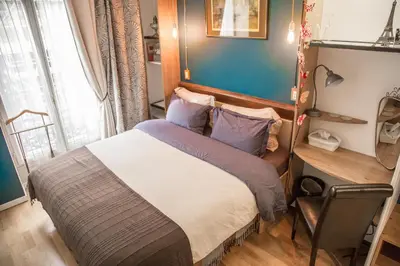 Un ou plusieurs lits dans un hébergement de l'établissement Cédric Accueille - Homestay PARIS