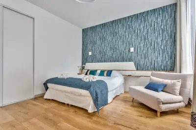 Un ou plusieurs lits dans un hébergement de l'établissement Amazing 2 Rooms Flat near Bastille - An Ecoloflat