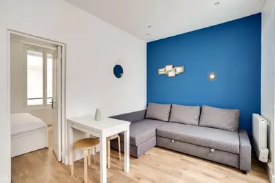 Coin salon dans l'établissement Apartment 3 people close Eiffel Tower by Weekome