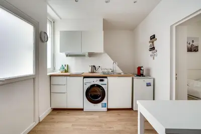 Cuisine ou kitchenette dans l'établissement Apartment 3 people close Eiffel Tower by Weekome