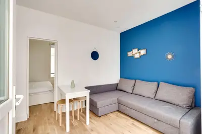 Coin salon dans l'établissement Apartment 3 people close Eiffel Tower by Weekome