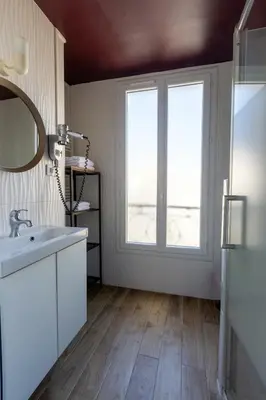 Cuisine ou kitchenette dans l'établissement Hôtel Maât Etoile