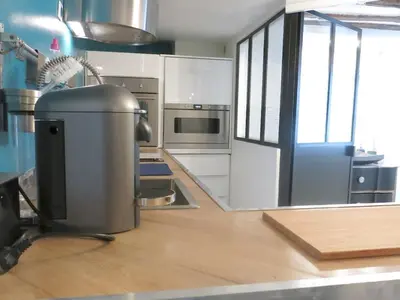 Cuisine ou kitchenette dans l'établissement Apartment Saintonge CityCosy