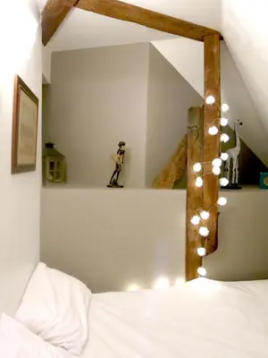 Un ou plusieurs lits dans un hébergement de l'établissement Apartment Saintonge CityCosy