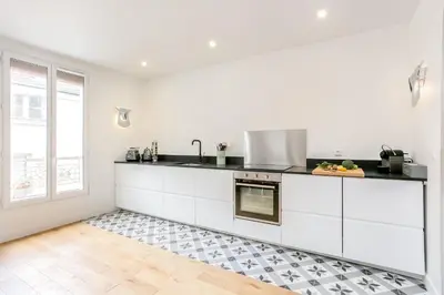 Cuisine ou kitchenette dans l'établissement Résidence Saint-Sabin