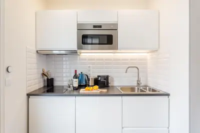 Cuisine ou kitchenette dans l'établissement Résidence Saint-Sabin