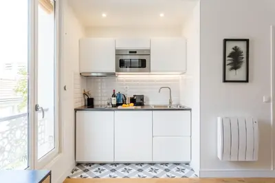 Cuisine ou kitchenette dans l'établissement Résidence Saint-Sabin