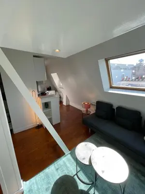 Coin salon dans l'établissement Beautiful Lincoln Apartment