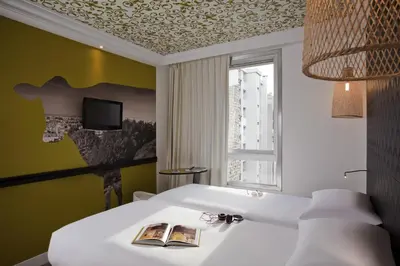 Un ou plusieurs lits dans un hébergement de l'établissement ibis Styles Paris Buttes Chaumont