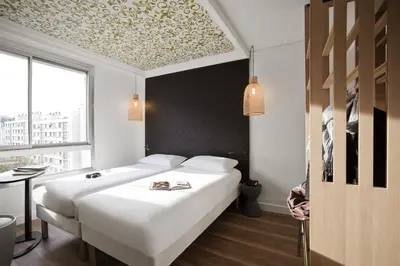 Un ou plusieurs lits dans un hébergement de l'établissement ibis Styles Paris Buttes Chaumont