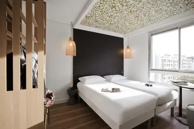 Un ou plusieurs lits dans un hébergement de l'établissement ibis Styles Paris Buttes Chaumont