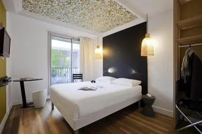 Un ou plusieurs lits dans un hébergement de l'établissement ibis Styles Paris Buttes Chaumont