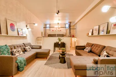 Coin salon dans l'établissement 33 - Flat Av des Champs-Élysées