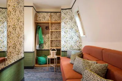Coin salon dans l'établissement Hôtel Jardin de Cluny
