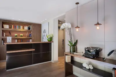 Cuisine ou kitchenette dans l'établissement Hôtel Le Tourville by Inwood Hotels