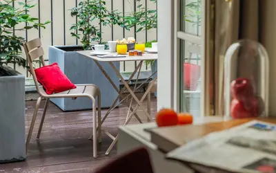 Coin salon dans l'établissement Hôtel Le Tourville by Inwood Hotels