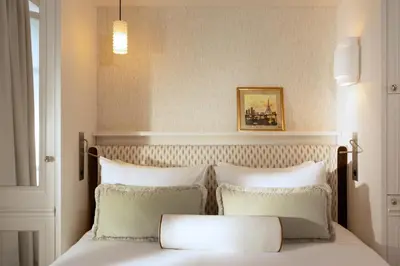 Un ou plusieurs lits dans un hébergement de l'établissement Almarine Eiffel Hotel & Spa by Malone