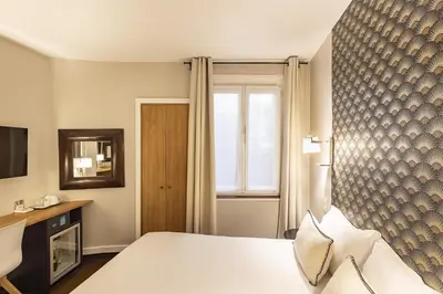 Un ou plusieurs lits dans un hébergement de l'établissement Best Western Aramis Saint Germain