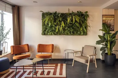 Coin salon dans l'établissement Best Western Aramis Saint Germain