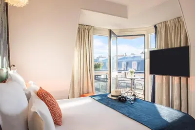 Un ou plusieurs lits dans un hébergement de l'établissement Hotel Yllen Eiffel
