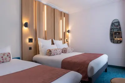 Un ou plusieurs lits dans un hébergement de l'établissement Leonardo Boutique Hotel Paris Opera