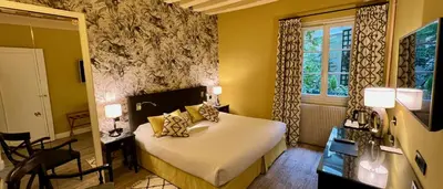 Un ou plusieurs lits dans un hébergement de l'établissement Hôtel Beaubourg