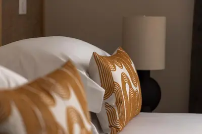 Un ou plusieurs lits dans un hébergement de l'établissement Hôtel Joe M