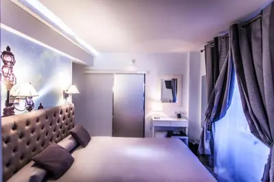 Un ou plusieurs lits dans un hébergement de l'établissement Hotel Ascot Opera