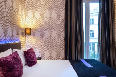 Un ou plusieurs lits dans un hébergement de l'établissement ATN Hôtel