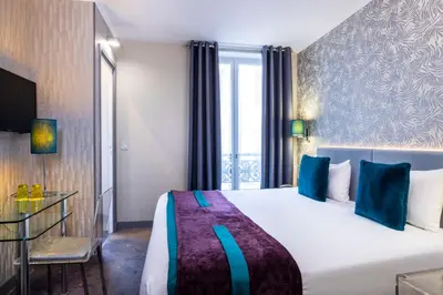 Un ou plusieurs lits dans un hébergement de l'établissement ATN Hôtel