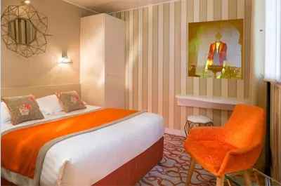 Un ou plusieurs lits dans un hébergement de l'établissement Hotel Best Western Anjou Lafayette