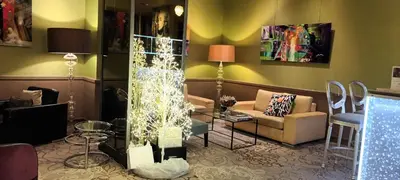 Coin salon dans l'établissement Hotel Best Western Anjou Lafayette
