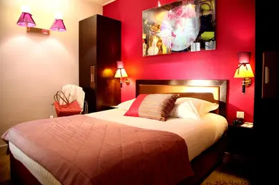 Un ou plusieurs lits dans un hébergement de l'établissement Hotel Best Western Anjou Lafayette