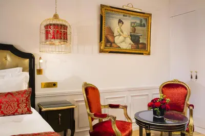 Un ou plusieurs lits dans un hébergement de l'établissement Académie Hôtel Saint Germain
