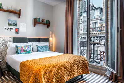 Un ou plusieurs lits dans un hébergement de l'établissement Kraft Hotel
