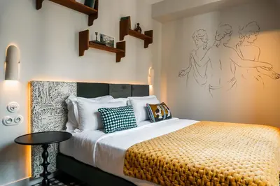 Un ou plusieurs lits dans un hébergement de l'établissement Kraft Hotel