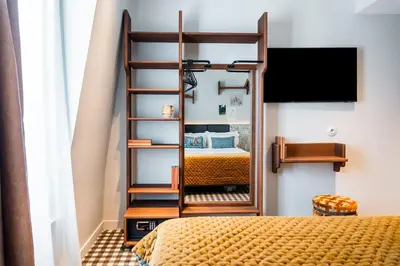 Un ou plusieurs lits dans un hébergement de l'établissement Kraft Hotel