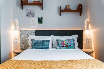 Un ou plusieurs lits dans un hébergement de l'établissement Kraft Hotel