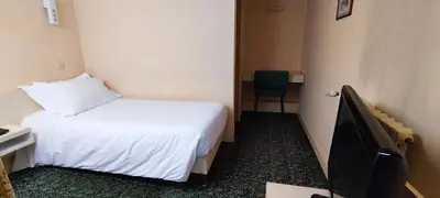 Télévision ou salle de divertissement dans l'établissement Grand Hôtel du Havre