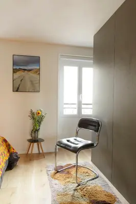 Coin salon dans l'établissement Le Marais Calme et lumineux
