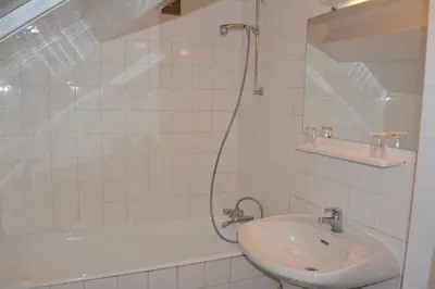 Salle de bains dans l'établissement Hôtel Stanislas sans ascenseur